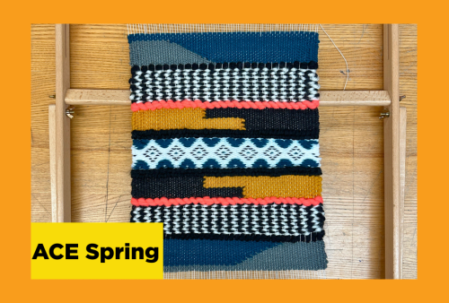 a hand woven pattern of fabric still attached to its loom