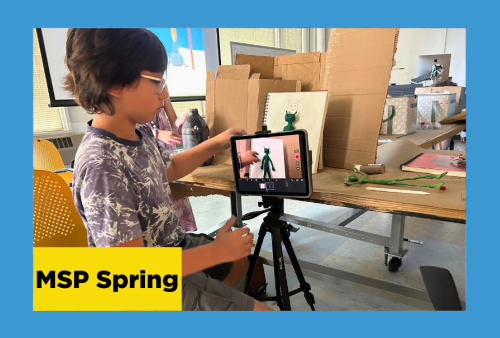 a young boy positions the camera from his ipad as he captures images for his stop-motion animation project at the school of the art institute of chicago