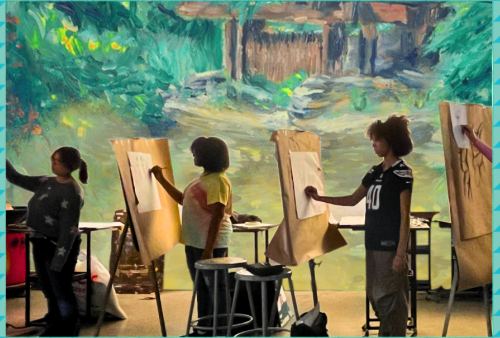 three students draw at easels with a painting of a green summer nature scene behind them