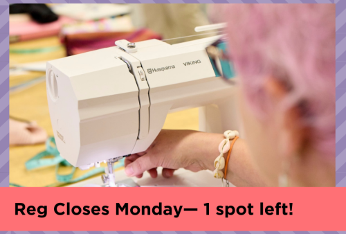 a woman with pink cotton candy hair feeds fabric through a sewing machine