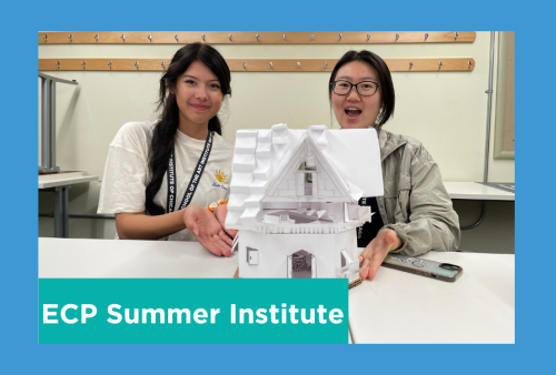 Two girls happily showcase their 3d model of a building