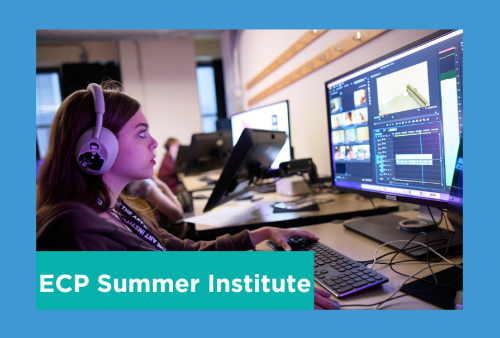 a girl is bathed in the purple light of her computer as she focuses on her project