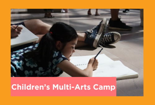 a young girl lays on the floor and draws dappled with sunlight