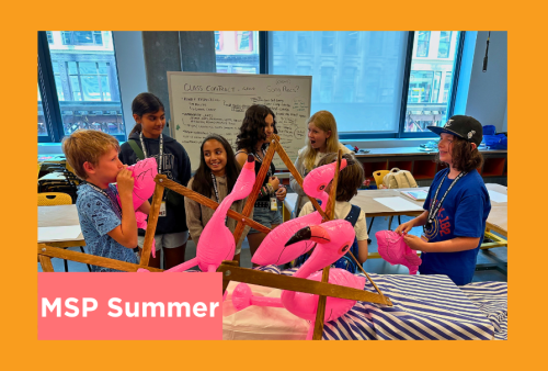 a group of kids play with inflatable flamingos