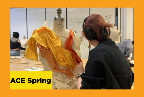 a student pins her orange and yellow fabric to a dress form 