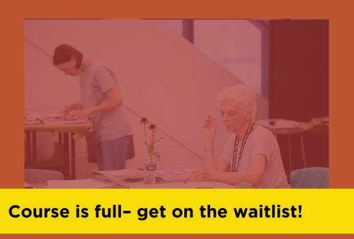 Two women painting in a studio classroom
