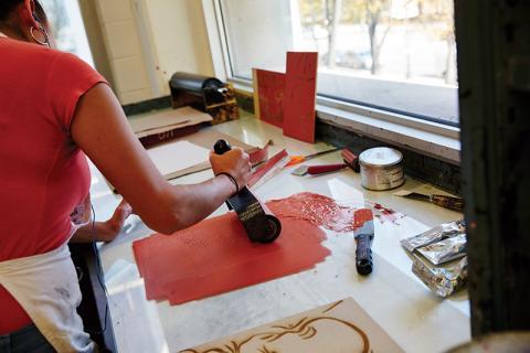 person making a print