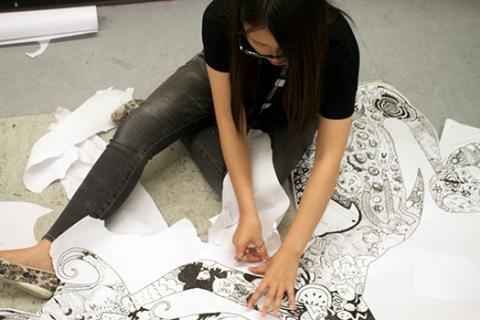 Girl drawing on floor