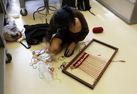 Girl with loom