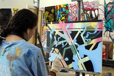 Girl in front of work