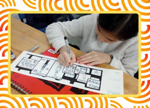 student drawing comic