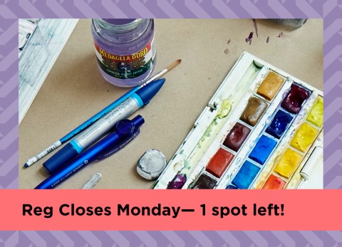 a palette of watercolor paints sits in the studio besides some brushes and pens and a jar of water