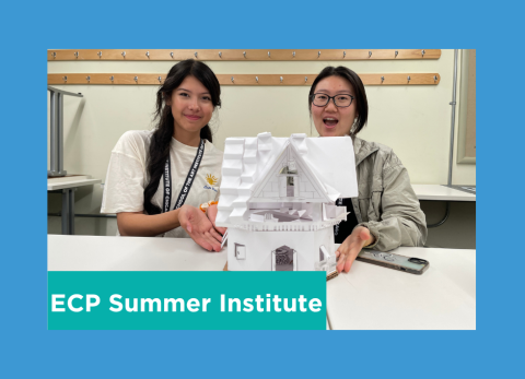 Two girls happily showcase their 3d model of a building