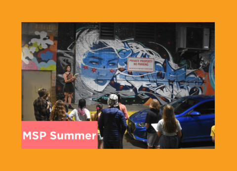 a teacher shows her students a dope mural painted in downtown chicago