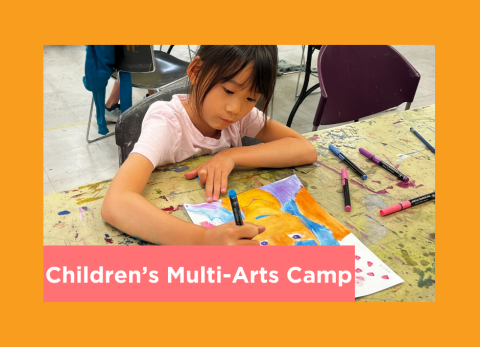 a young girl draws a portraits using really good colors