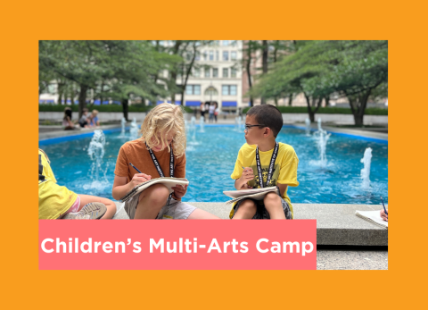 two boys draw in their sketchbooks on a beautiful day in downtown chicago
