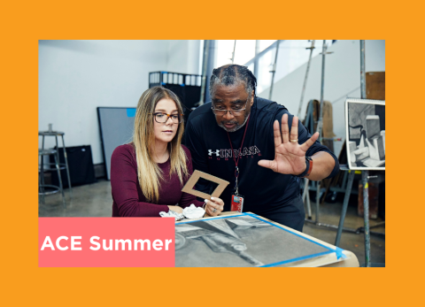 a teacher uses his hands to explain rendering techniques to his student